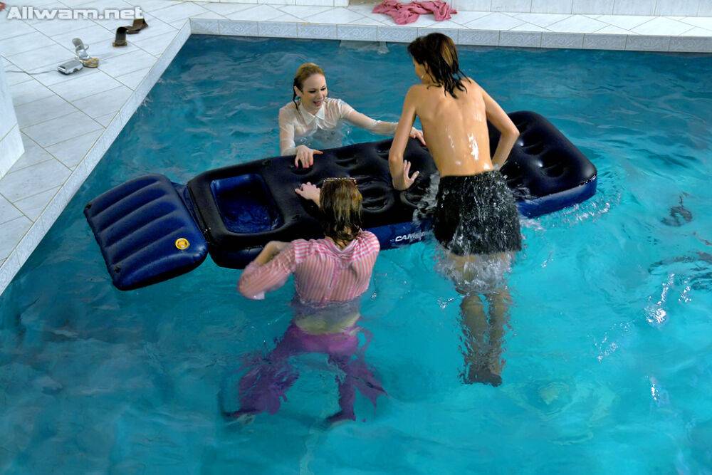 Fully clothed fetish ladies having some wet fun in the pool - #3