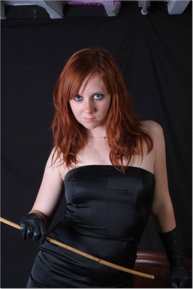 Sexy redhead flexes a cane before touching her tight slit with leather gloves - #5