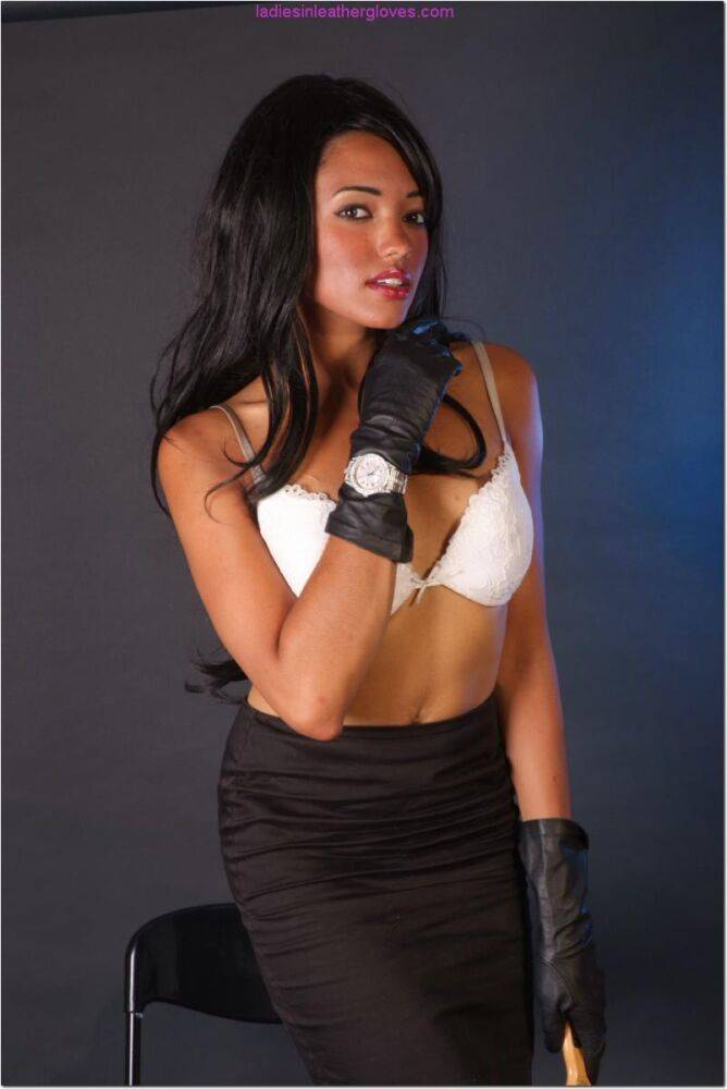 Hot black woman wields a hairbrush in black leather gloves and a skirt - #8