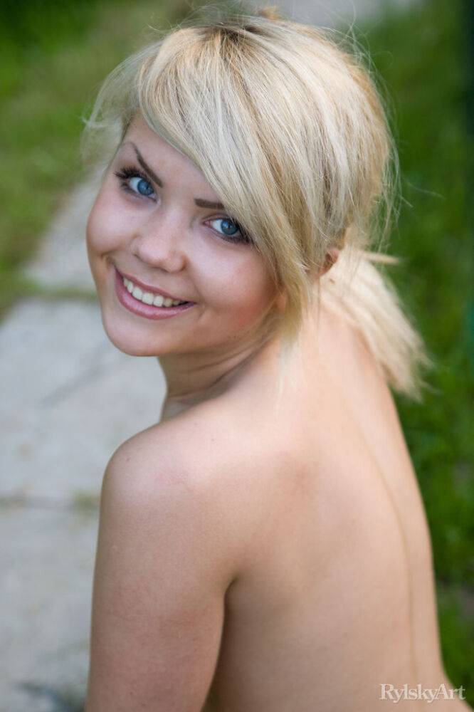 Cute young blonde Iveta poses in the nude while in a garden - #12