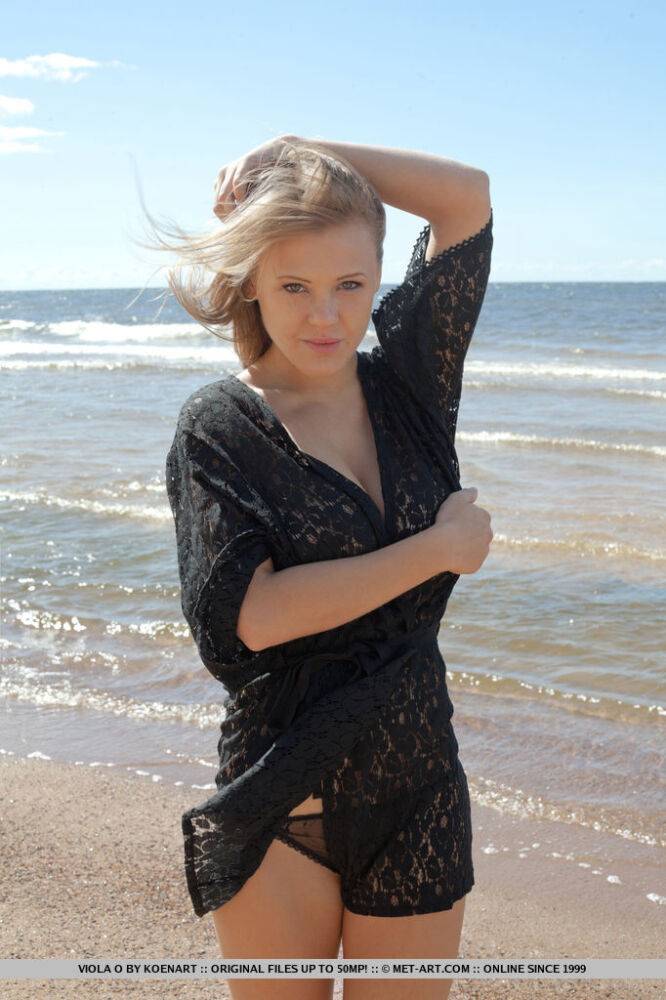Sensual blonde babe Viola unveils her big tatas on the beach - #6