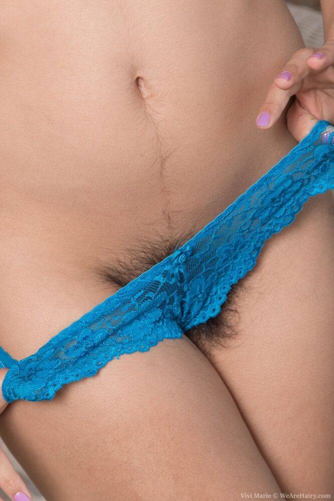 Lounging brunette Vivi Marie with hairy armpits shows furry twat on all fours - #12
