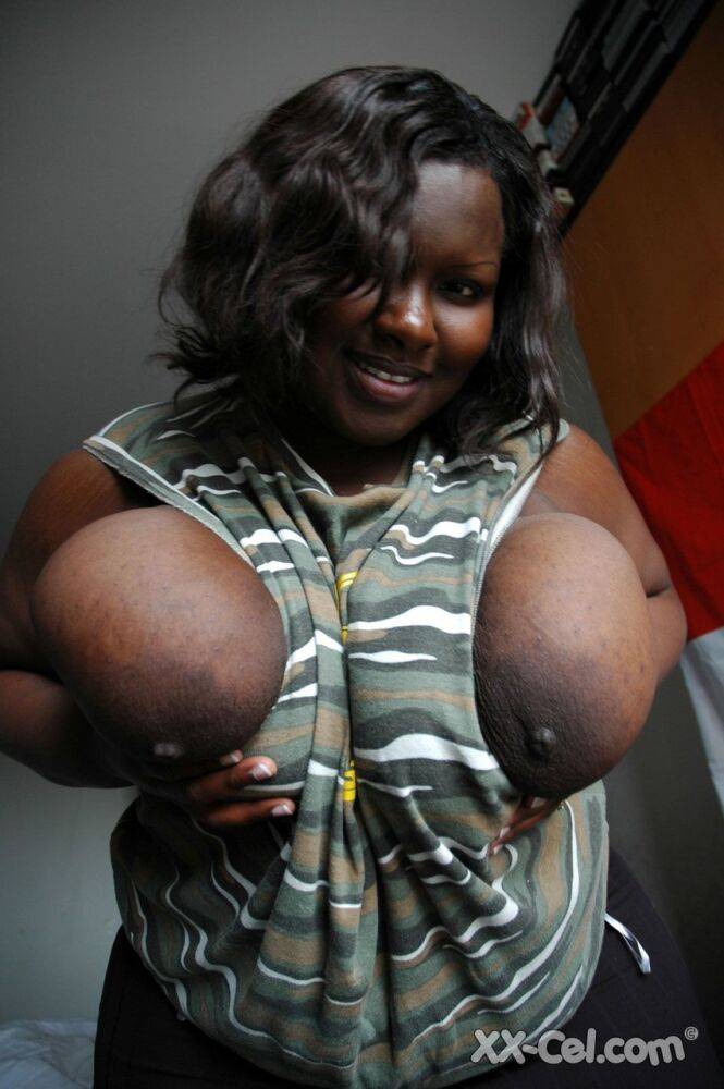 Fat black woman Mariana Kodjo showing off her extra-large natural tits - #5