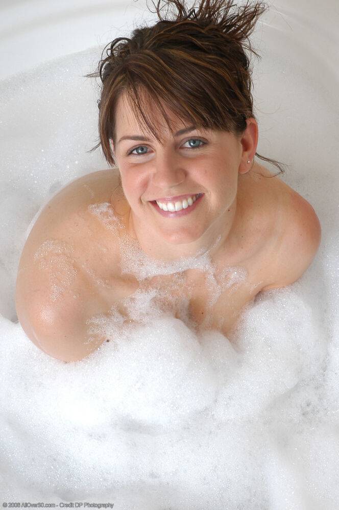 Blue eyed MILF Tori shows her tasty tits and ass in a full foamy tub - #2