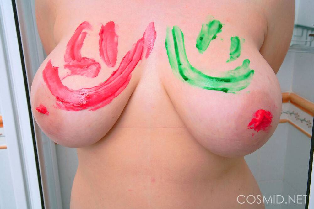 Chubby amateur covers her big boobs with finger paint before showering - #14