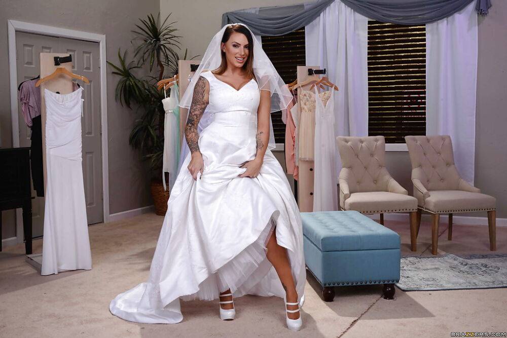 Tattooed Latina bride Juelz Ventura flashing leg and garter - #2