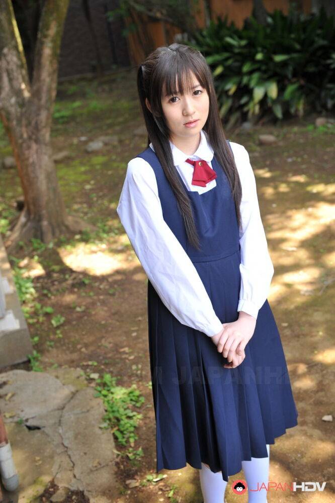 Charming Japanese babe posing in her cute school outfit in the garden - #8
