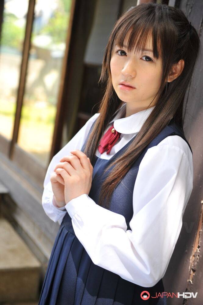 Charming Japanese babe posing in her cute school outfit in the garden - #4