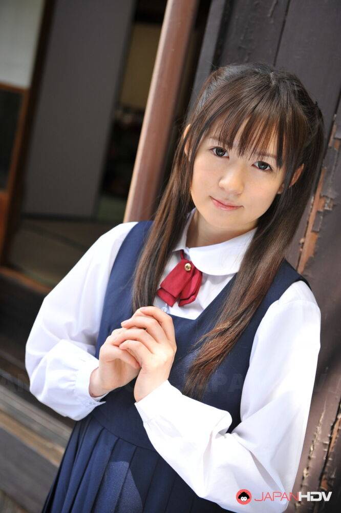 Charming Japanese babe posing in her cute school outfit in the garden - #3