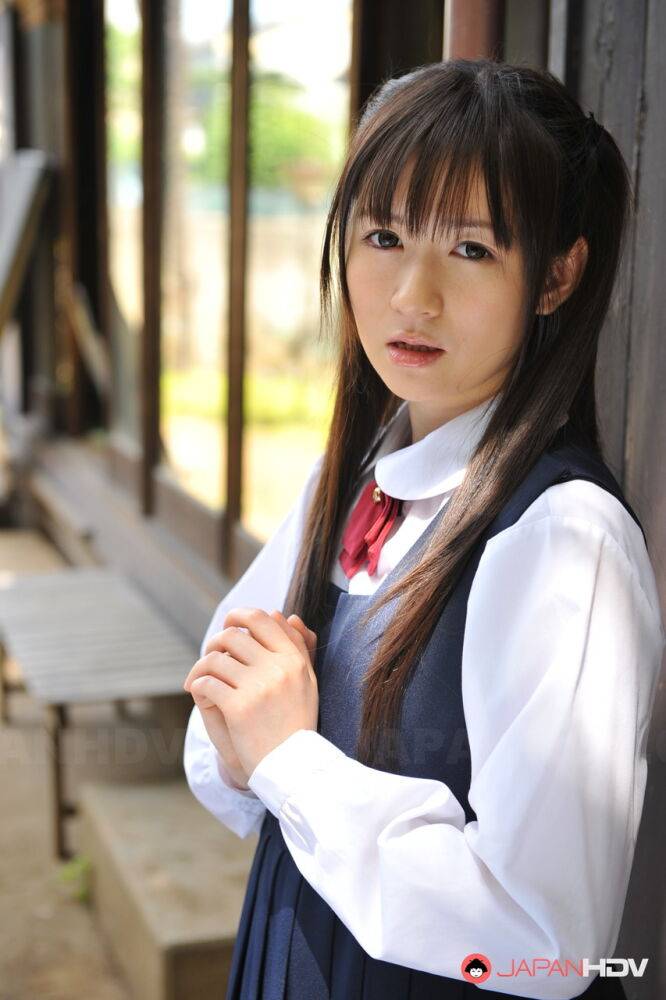 Charming Japanese babe posing in her cute school outfit in the garden - #5