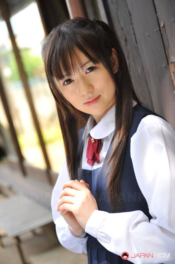 Charming Japanese babe posing in her cute school outfit in the garden - #6