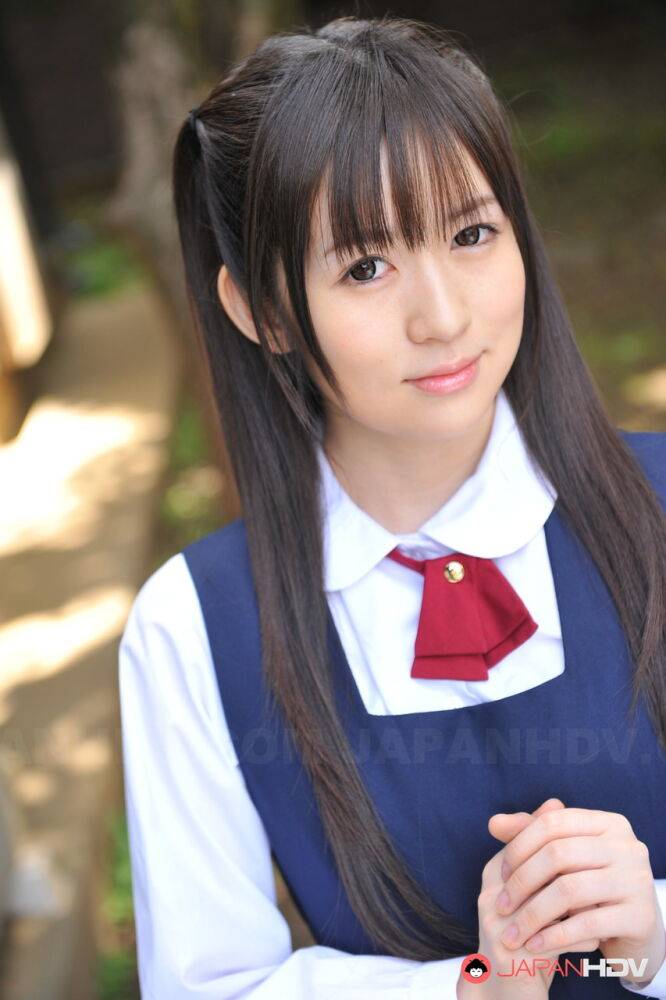 Charming Japanese babe posing in her cute school outfit in the garden - #15