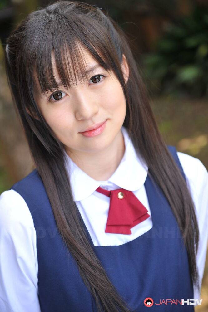 Charming Japanese babe posing in her cute school outfit in the garden - #11