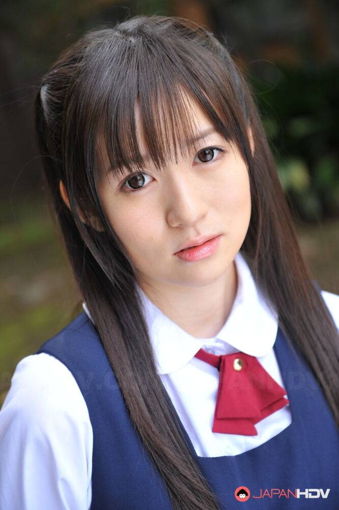 Charming Japanese babe posing in her cute school outfit in the garden - #12