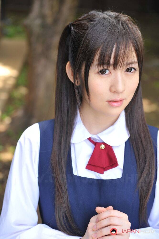 Charming Japanese babe posing in her cute school outfit in the garden - #14