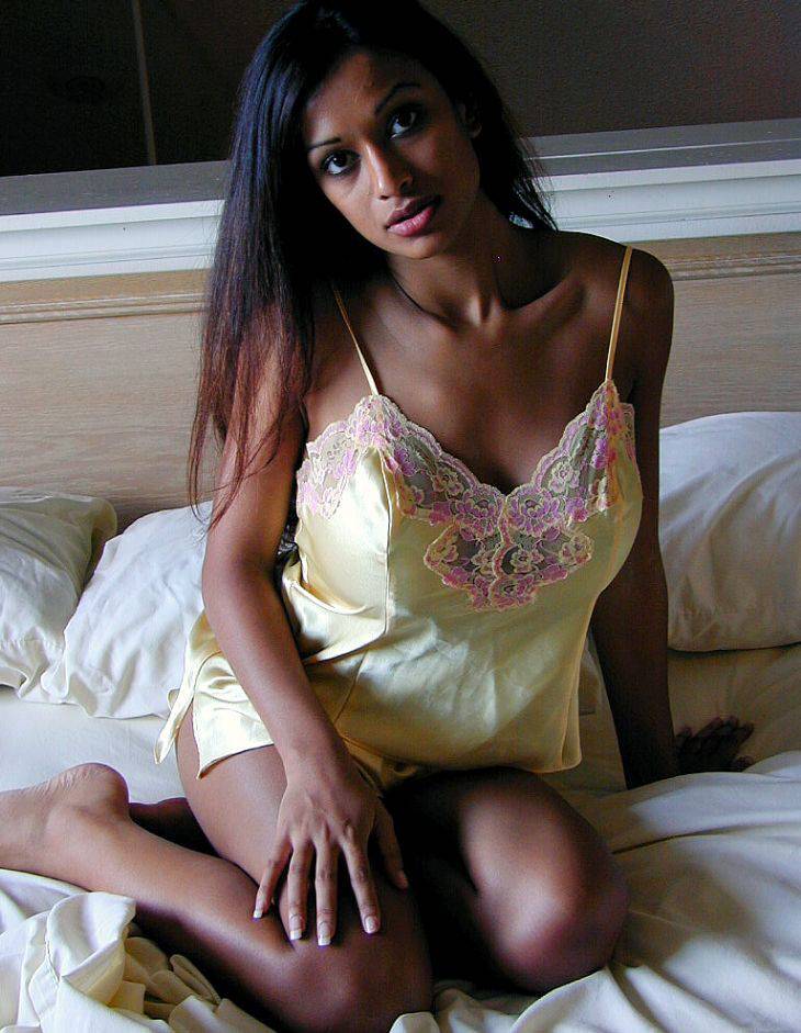 Sexy Indian girl uncovers round boobs as she slips off satin lingerie - #1