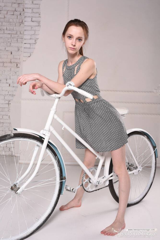 Skinny teen removes her dress after cycling to stand totally naked - #2