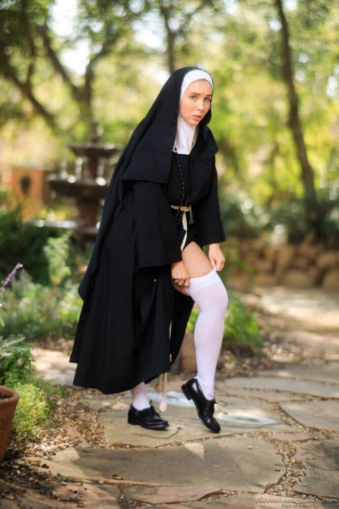 Thick Nun exposes herself in the courtyard wearing over the knee socks - #3