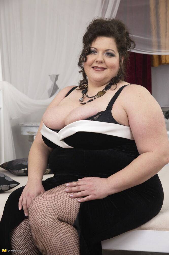 Classy mature fatty in black dress presents her massive big tits for fondling - #5