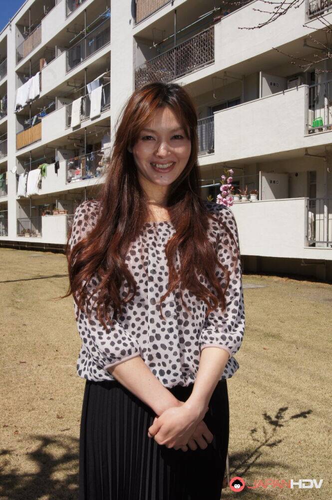 Japanese MILF Hitomi Kano wears a nice smile while modeling non nude - #9