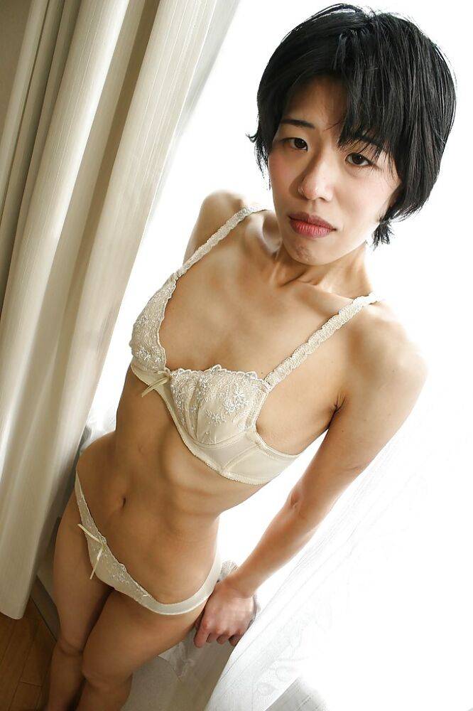 Skinny Asian milf Shinobu Funayama is undressing her lingerie - #2