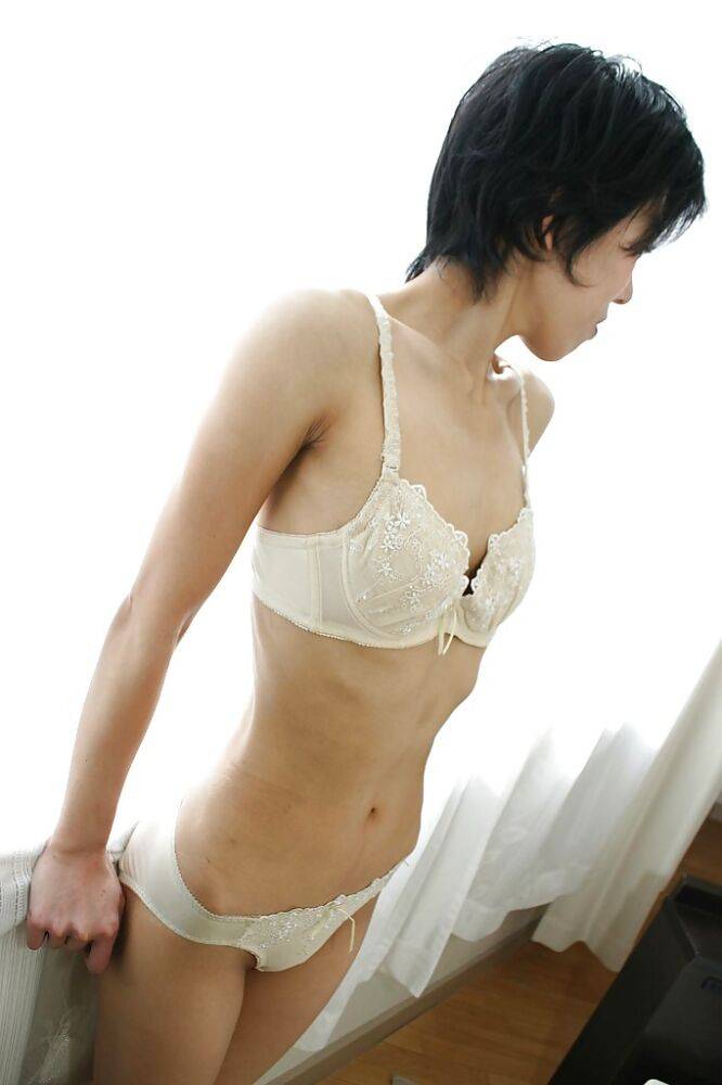 Skinny Asian milf Shinobu Funayama is undressing her lingerie - #4