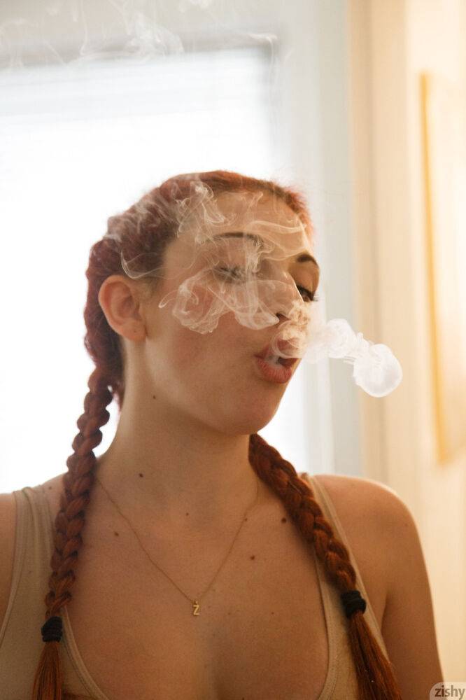 Redhead teen Gina Rosini smokes and shows her big breasts indoors - #2