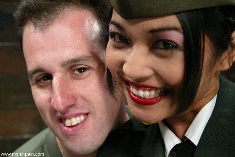 Asian general Mika Tan disciplines a soldier and grabs his dick | Photo: 3987084