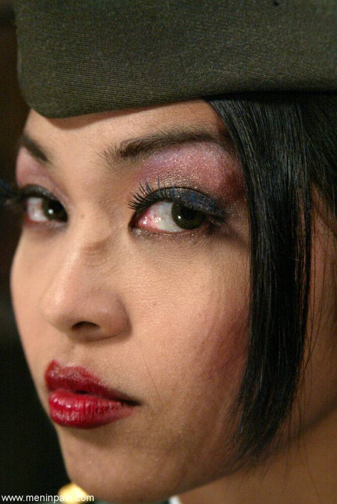 Asian general Mika Tan disciplines a soldier and grabs his dick | Photo: 3987116
