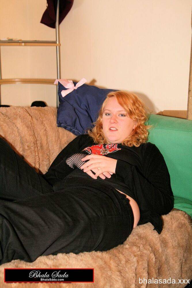 Redheaded fatty strips her sweatshirt and shows her cleavage in a black bra - #10