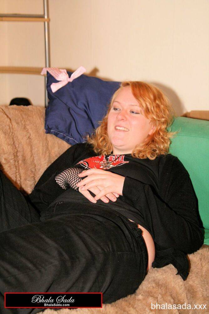 Redheaded fatty strips her sweatshirt and shows her cleavage in a black bra - #9