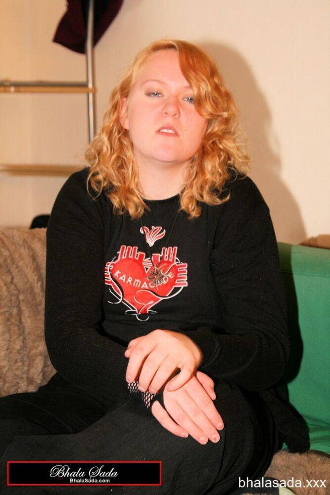 Redheaded fatty strips her sweatshirt and shows her cleavage in a black bra - #3