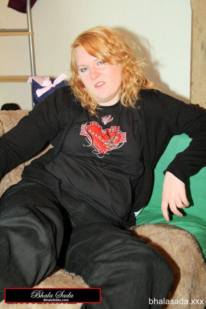 Redheaded fatty strips her sweatshirt and shows her cleavage in a black bra - #8