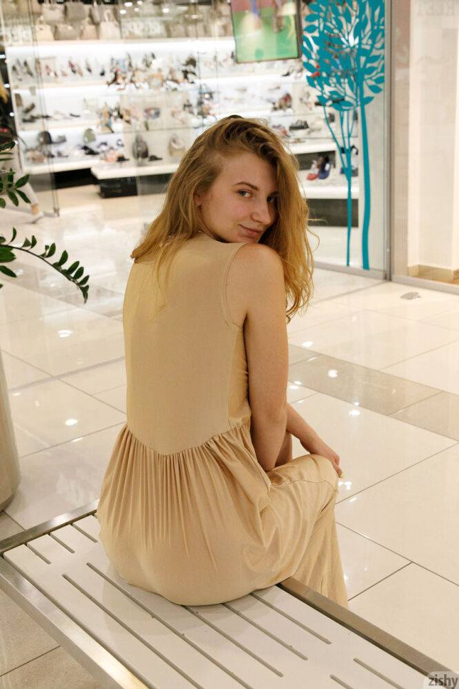 Ukrainian babe Regan Budimir flashes her big tit while posing at the mall - #8