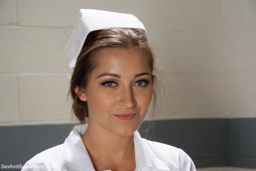 Gorgeous nurse with a nice butt Dani Daniels strips and poses in high heels - #17