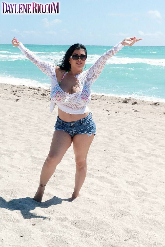 Mature fatty Daylene Rio frees big saggy tits to catch some rays at the beach - #2