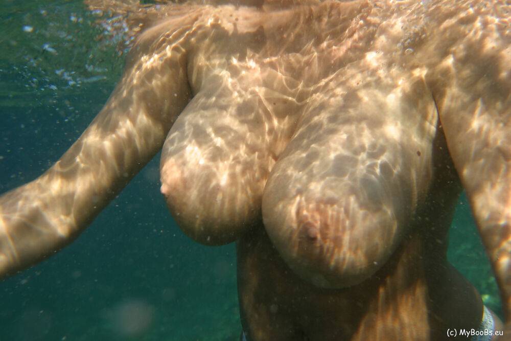Big boobed lesbians Aneta Buena and Kora Kryk go for a topless swim - #2