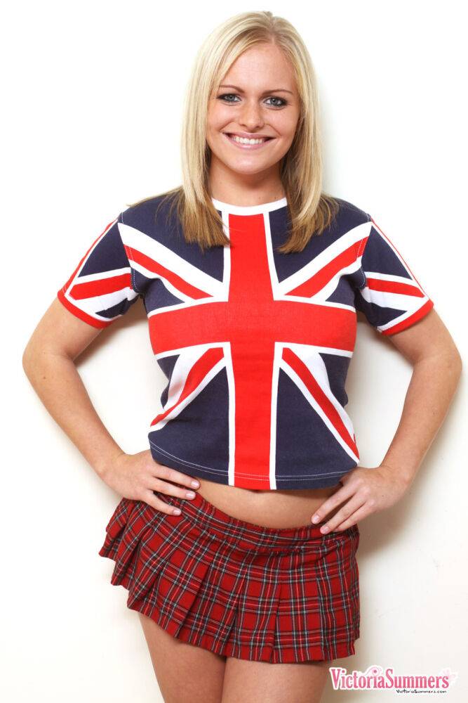 Blonde amateur Victoria Summers frees her big naturals from a Union Jack shirt - #13