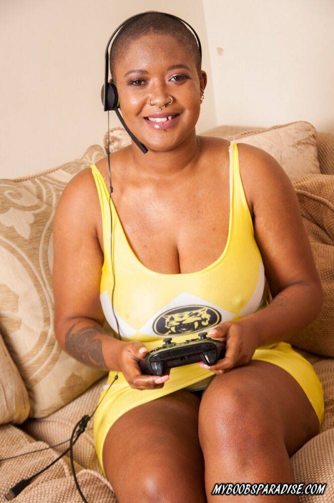 Ebony gamer Bria Marcer bares her big tits and booty while on a sofa - #12