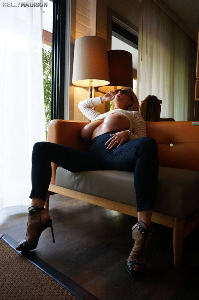 Busty MILF Kelly Madison gives handjob & flaunts massive big tits everywhere - #2