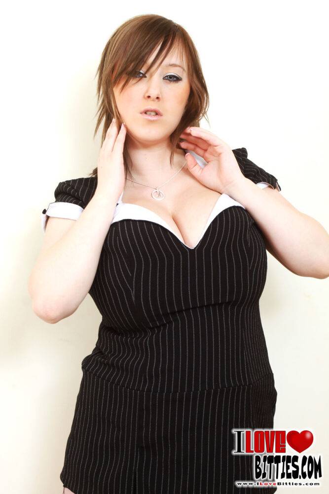 Chubby brunette Malibu in fishnet stockings sheds black bra to free big tits - #5