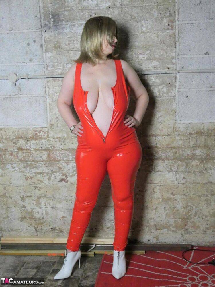 Mature amateur Posh Sophia frees her big naturals from red latex attire - #14