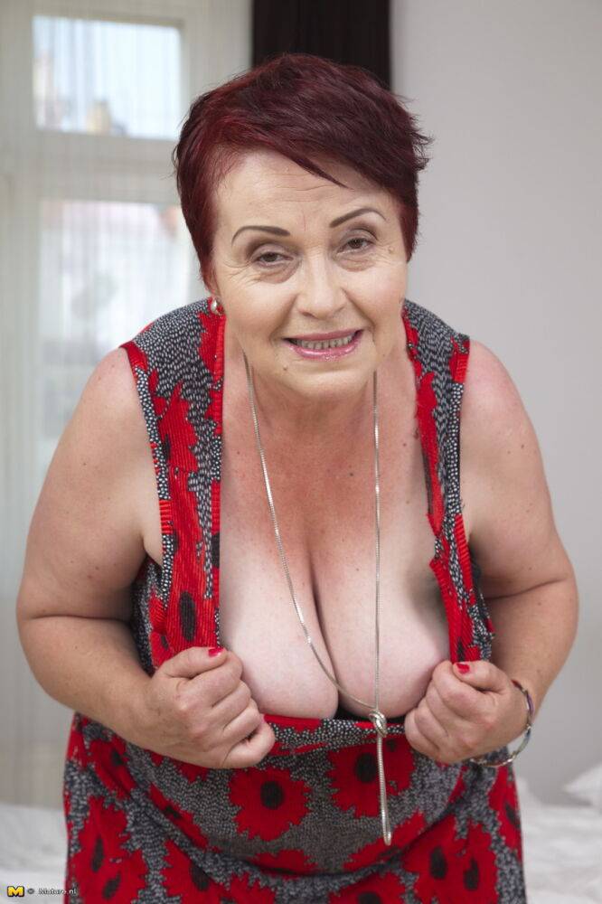 Hot old granny displays her very big breasts to lick her hard nipples - #14