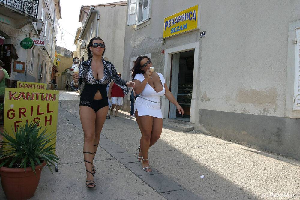 Lesbian women Aneta Buena & Kora Kryk play with their big tits in public | Photo: 4113976