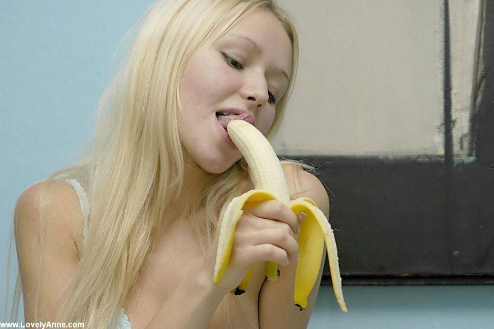 Innocent Anne eating a big banana naked - #1