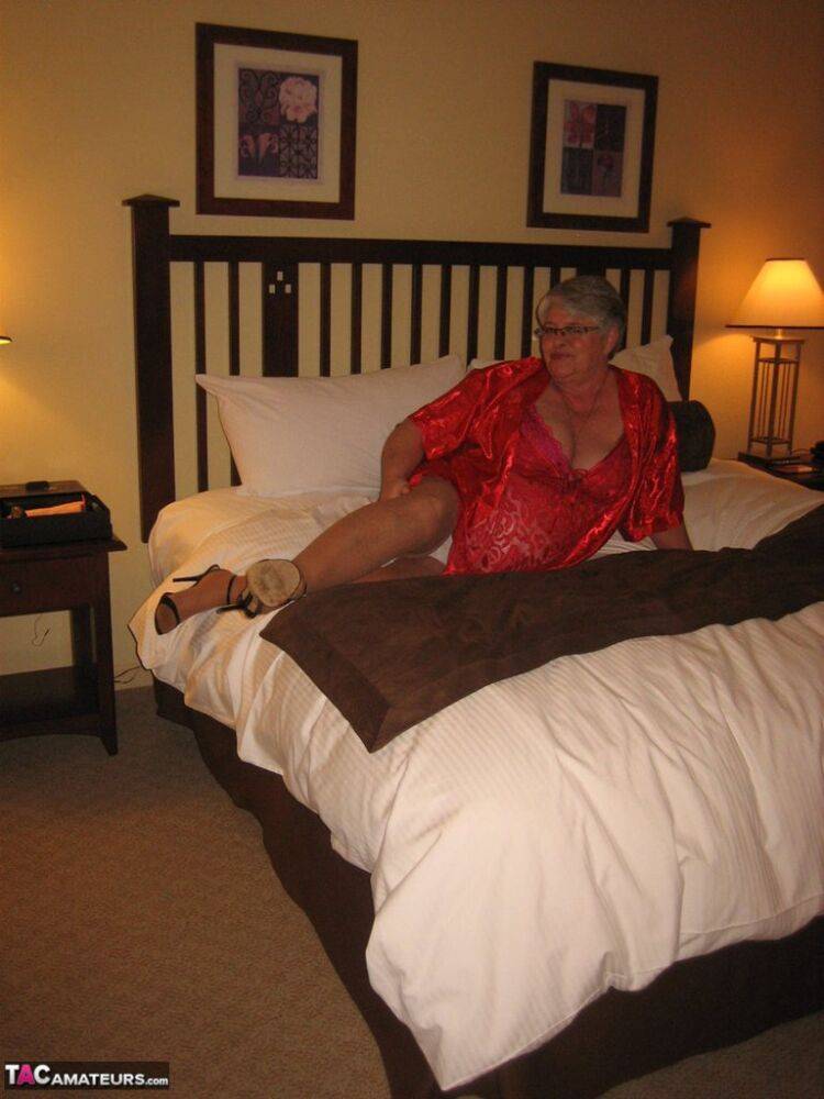 Fat granny Girdle Goddess whips out her big boobs on a bed in pantyhose - #1