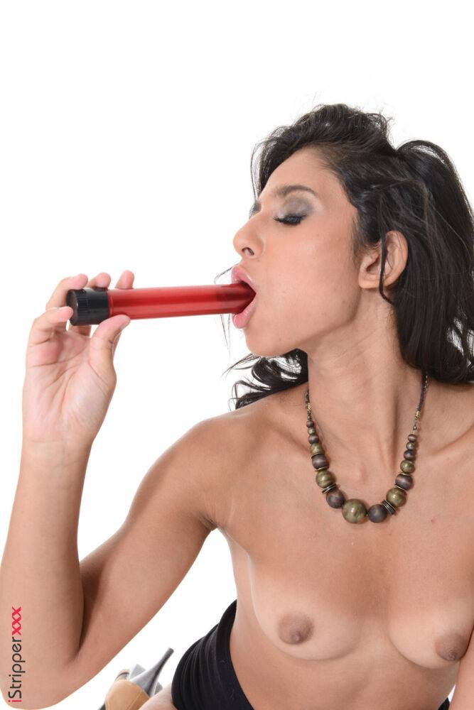 Hot Latina girl Ria Rodriguez gets naked before masturbating with a vibrator | Photo: 4190427