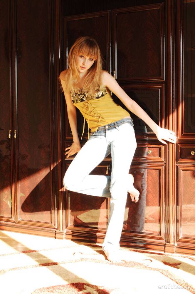 Nata D teases in the shadows as she takes off her fitted jeans and yellow top - #1