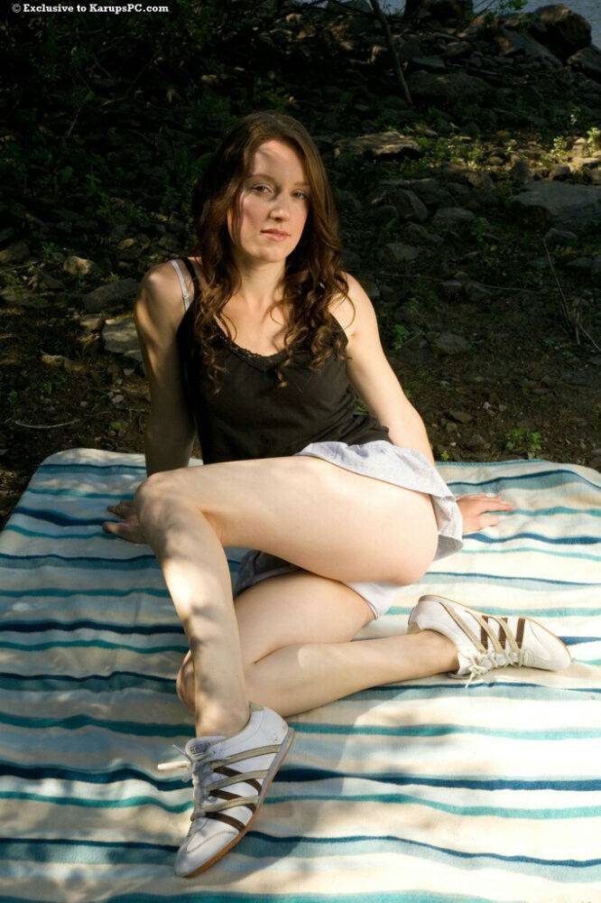 Frisky brunette amateur undressing and teasing her shaved gash outdoor - #8