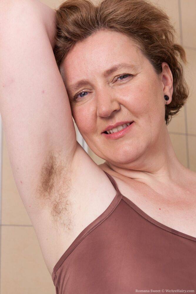 Mature fatty Romana Sweet shows off unshaven armpits and beaver in bathroom - #2